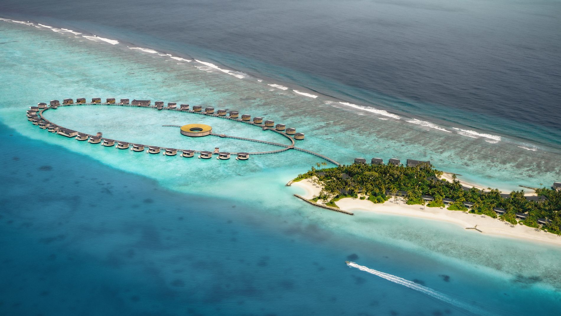Luftaufnahme des Ritz-Carlton Fari Islands Resorts: kreisförmige Wasserbungalows, zentraler gelber Ring, türkisblaues Meer. Luftaufnahme des Ritz-Carlton Fari Islands Resorts: kreisförmige Wasserbungalows, zentraler gelber Ring, türkisblaues Meer.