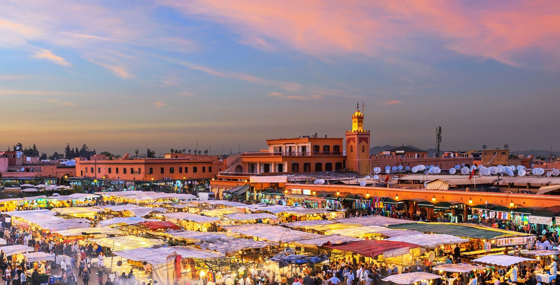 Famous Djemaa El Fna Square in early evening light, Marrakech, Morocco with the Koutoubia Mosque, Northern Africa